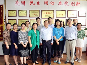 市委常委、统战部长谭小平走访市委会机关